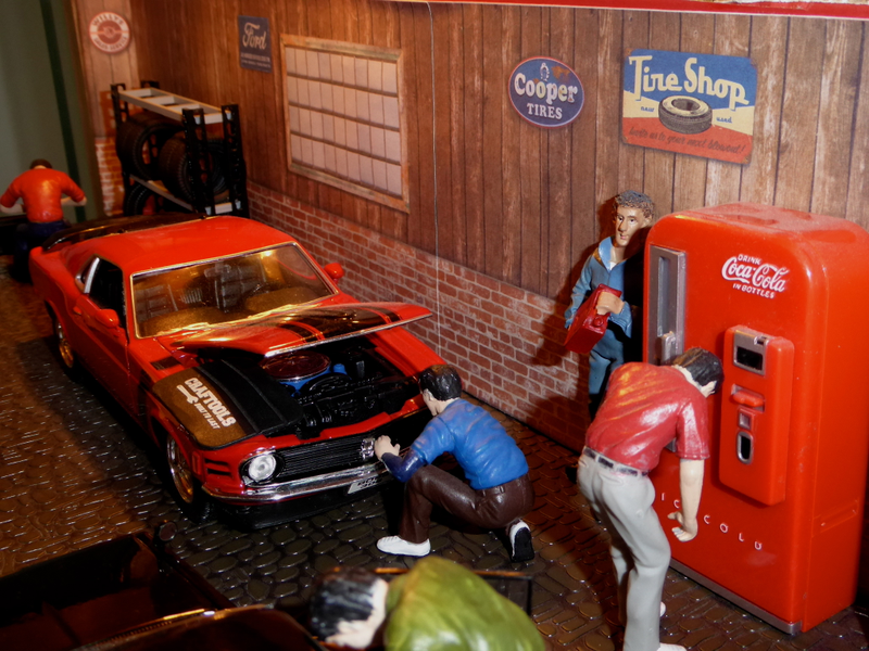 Matthew needed a break with a cold drink while Boxster inspects the red Mustang